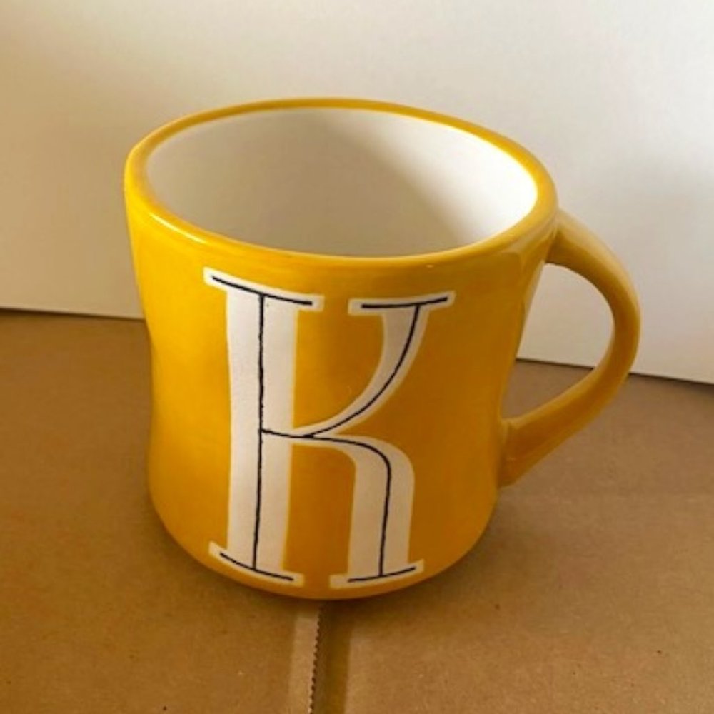 Coffee mug, Anthroplolgie, Hand Painted Yellow K